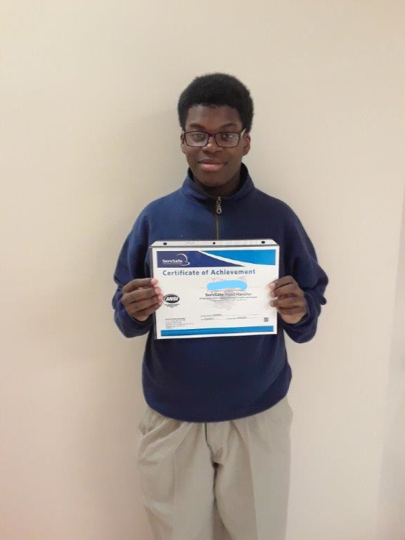 Student with ServSafe certificate.
